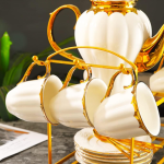 Patterned Ceramic Coffee and Tea Set with Gold Accents and Teapot